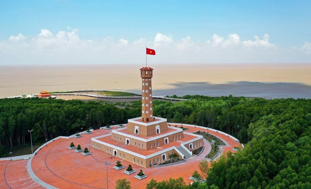 Tourists taking photos at Cape Ca Mau – the southernmost tip of Vietnam